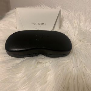 Michael Kors and Rayban sunglass cases.